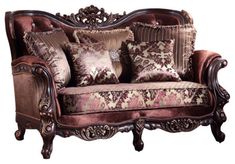 an ornate couch with many pillows on it's back and arm rests against a white background