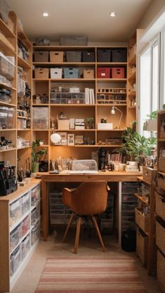 a home office with lots of shelves and drawers