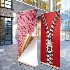 two billboards with ice cream on them in front of a building