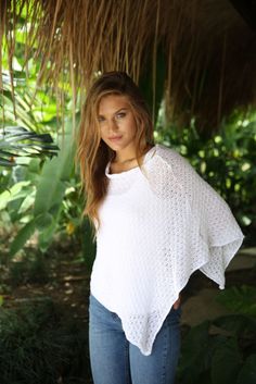 Easy slipover design works as a lightweight cropped shrug over dresses, or a lightweight semi sheer poncho top with jeans, skirts or cutoff shorts Sheer Poncho, Top With Jeans, Cropped Shrug, Poncho Top, Poncho Tops, Cutoff Shorts, Cut Off Shorts, Pullover Sweater