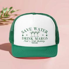 a green and white trucker hat with save water drink margs printed on it