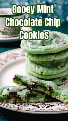 cookies stacked on top of each other with the words gooey mint chocolate chip cookies