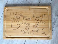 a bamboo tray with writing on it that says, let's love for you