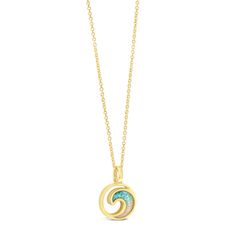 a gold necklace with a turquoise stone in the center and a circular design on it