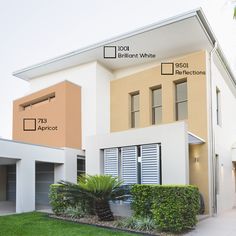 an image of a modern house with different colors and sizes on the walls, windows, and doors