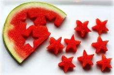 slices of watermelon are arranged in the shape of stars