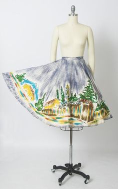 ♡ PLEASE ENLARGE PHOTOS FOR MORE DETAIL ♡D E T A I L S• 1950s circle skirt• cotton• hand-painted novelty border print featuring a town + trees• trimmed in hundreds of colorful metallic sequins• true circle shape• inner waistband ties + outer waistband ties (see last photo)• unlined• label: no tag present (made in Mexico)M E A S U R E M E N T Sfits like a: x-smallwaist: 22-24"hips: openlength: 26"C O N D I T I O NVery good vintage condition. Ready to wear! Two sequins are missing, but this isn't Vintage Pleated Mini Skirt, Vintage Multicolor Skirt, 1950s Circle Skirt, Vintage Fashion 1930s, 1950s Skirt, Vintage 1950s Dresses, 50s Dresses, Border Print, Circle Shape