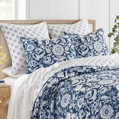 The Laure Indigo Reversible Quilt Set by Levtex Home is inspired by a beautiful country garden filled with blooming flowers . Offered in classic indigo, blue and white, this design will immediately transform your bedroom. This reversible quilt features gorgeous bright flowers in white and blue on an indigo grpund. on the front, reversing to a small blue and indigo medallion on white on the back. The Quilt and Sham have a cotton front and back, filled with a cotton-rich filler, and are machine wa Duvet Comforter Sets, Modern Cabin Interior, Indigo Quilt, Ruffle Shower Curtains, Crib Bedding Boy, Girl Nursery Bedding, King Quilt Sets, Crib Bedding Girl, Fall Bedding