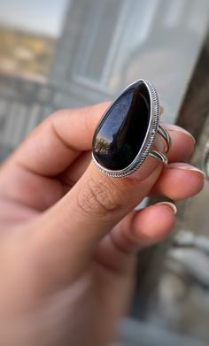 Silver ring with natural black obsidian for women! This ring is a perfect gift idea to the one who loves natural black color of stone and minimalist style) The ring size is adjustable, so you can give a gift without knowing the size! But if you want we can make any size of this ring! Also, we can make matching earrings, pendants, and bracelets! Just message me) Choosing Shahinian Jewelry, you choose the unique design, the best quality, and the perfect look! Ring weight: 10,5 gr ✍️If you have any Black Teardrop Natural Stone Jewelry, Elegant Obsidian Ring Jewelry, Black Obsidian Gemstone Ring, Black Rings With Natural Stones For Gift, Black Obsidian Rings For Gift, Black Sterling Silver Crystal Ring, Black Sterling Silver Cabochon Ring, Handmade Black Crystal Ring In Sterling Silver, Black Cabochon Sterling Silver Ring