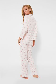 Lalide à Paris is a French loungewear brand. Its vision is to bring the savoir-faire and feminine elegance of french fashion to women who want to boost the feeling of wellness in their everyday life.These adorable pajamas will make your nighttime look just as chic as your daytime one. The Rose Bud Juno Pajama Set is made from a soft satin cotton with pink and green motifs on a pale pink background. Just add some cozy slippers and settle in for a movie night! Notch collar Long sleeves Front butto French Loungewear, Adorable Pajamas, Loungewear Brand, Cozy Slippers, Feminine Elegance, Rose Bud, Plus And Minus, Cocktail Attire, A Paris