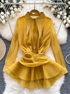 Bold and feminine, this yellow blouse strikes the perfect balance between classic elegance and modern flair. The unique pointed collar brings a vintage touch, while the flowing fabric and ruffled hem add a playful element to the design. The cinched waist ensures a flattering fit, making this blouse a great choice for a variety of body types. Ideal for work or special occasions, it pairs effortlessly with everything from trousers to skirts. The lightweight, breathable fabric ensures all-day comfort, making it a go-to piece in any wardrobe. Size Top Length (cm) Bust (cm) Waist (cm) Sleeve Length (cm) Shoulder Width (cm) Weight (kg) One Size 85 108 60-80 60 39 0.13 Streetwear Blouse, Flowing Blouse, Corset Blouse, Bohemian Top, Ivory Blouse, Shirt Blouses Women's, Flowing Fabric, Blouse Sale, Harajuku Streetwear