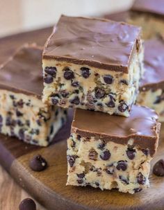 chocolate chip cookie doughnut bars stacked on top of each other