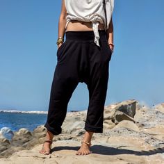 Black Urban Style Drop Harem Pants, Yoga Dhoti Pants, Samurai Ninja Pants. Great as a casual wear, these pants are not as baggy as our original glorkas. Yet they are still super comfortable and made from the softest pleasant cotton blend. This style has a bit more of the urban look. You can wear them all the way down or roll the bottoms up to the ankles to add a bit of edgy look.  -Unisex -Stretch  -Flowing relaxed fit -Inner drawstring to secure the waist -2 side pockets - come in 2 colors: bla Women Empowerment Project, Samurai Ninja, Black Harem Pants, Tom Sawyer, Fashion District, Style Noir, Edgy Look, Loose Pants, Pants Design