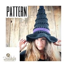 a woman with long hair wearing a knitted witches hat