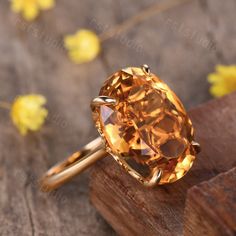 Citrine Engagement Ring 14x18mm Oval Shaped Yellow Gemstone Ring Halo Diamond Wedding Band Solid 14K rose Gold Statement Ring Solid 14k white/ rose/yellow gold main ring Metal Type: Solid 14k rose gold width of band (bottom) about 1.2mm Main Stone: Natural VS yellow citrine Carat Weight: 14x18mm Cut: Oval Cut Gem Weight: 16ctw Other Features:Comfort Fit Return and refund: We provide 30days return and exchange service. (Custom order is made by Unique demand, will be non-returnable and non-refunda Cheap Yellow Ring Jewelry, Luxury Citrine Crystal Ring For Formal Occasions, Luxury Oval Solitaire Topaz Ring, Oval Solitaire Topaz Ring In Rose Gold, Oval Orange Topaz Ring For Gift, Oval Orange Topaz Ring Gift, Orange Oval Topaz Ring For Gift, Orange Oval Topaz Ring Gift, Orange Oval Topaz Rings