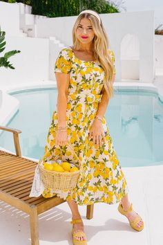 Meredith Dress in Lemons – Ivy City Co Yellow Summer Dress With Fruit Print, Summer Lemon Print Dress For Brunch, Midi Length Lemon Print Dress For Garden Party, Garden Party Lemon Print Midi Dress, Summer Brunch Lemon Print Dresses, Summer Lemon Print Midi Dress For Brunch, Summer Lemon Print Midi Dress, Short Sleeve Fruit Print Dress For Brunch, Fruit Print Short Sleeve Dresses For Brunch