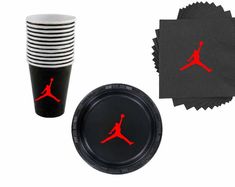 a stack of black paper plates and napkins with red jordan logo on the side