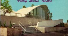 an advertisement for the valley music theatre with stairs leading up to it and trees in the background