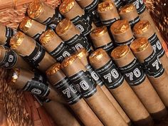 a pile of cigars sitting next to each other