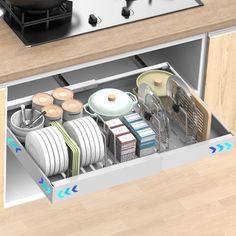 an open dishwasher drawer with dishes and pans on the bottom, next to a stove