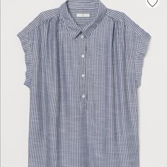 Blouse In Airy Woven Fabric With Short Dolman Sleeves. Slightly Longer In The Back. H&m V-neck Tops For Daywear, H&m Blue Workwear Top, Blue H&m Top For Work, Casual Blue H&m Blouse, H&m Short Sleeve Work Tops, H&m Short Sleeve Tops For Work, H&m Casual Shirt For Daywear, H&m Short Sleeve Blouse For Summer, H&m Short Sleeve Summer Blouse