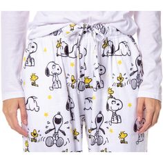 In 1950 Charles M. Schulz introduced to the world a clever comic strip with a young boy and the coolest Beagle dog around, Charlie Brown and Snoopy! Soon the comic strip spawned multiple hit cartoons, like A Charlie Brown Christmas, It's The Great Pumpkin, Charlie Brown, and Charlie Brown's All-Stars. These Peanuts pajama pants feature the coolest Beagle dog around, Snoopy, and his best friend Woodstock laughing and hanging out, with stars surrounding them. to curl up in and show off how much of Snoopy Pajama Pants, Snoopy Pj Pants, Snoopy Merch, Snoopy Clothes, Charlie Brown Costume, Peanuts Merchandise, Snoopy Items, Snoopy Pajamas, Snoopy Characters