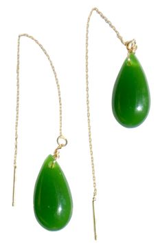 The Waterdrop earrings feature a lab nephrite pendant in rich green on a delicate gold string. Lab nephrite. Made by handwork of carving and polishing. Weight: 4g/pair Gemstone: Lab nephrite, 10mm x 20mm x 5mm String: gold-plated S925 sterling silver, length 80mm Yellow Gold Jade Drop Earrings, Green Teardrop Necklace With Matching Earrings, Green Long Drop Jewelry For Gift, Yellow Gold Jade Dangle Jewelry, Green May Birthstone Long Drop Jewelry, Green Jade Teardrop Pendant Jewelry, Green Teardrop Pendant Jewelry With Matching Earrings, Adjustable Green Teardrop Jewelry, Green Adjustable Teardrop Jewelry