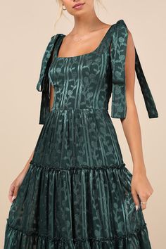 You'll stand out in everyone's memory with an adorable look like the Lulus Picturesque Allure Green Jacquard Tie-Strap Maxi Dress! Lightweight woven fabric, with a shiny, burnout floral jacquard and striped pattern throughout, falls from tying straps into a flattering square neckline and a princess-seamed bodice. High, fitted waist sits atop a ruffled, tiered skirt that finishes at an elegant maxi hem. Smocked panel at back and hidden zipper/clasp. Fit: This garment fits true to size. Length: Floor length. Size medium measures 59.75" from shoulder to hem. Bust: Great for any cup size. Waist: Fitted - very fitted at natural waist. Hip: Not Fitted - fuller skirt allows room for hips. Undergarments: May be worn with a strapless bra, adhesive bra, petals, or no bra. Fabric: Fabric has no stret Green Wedding Guest Dresses, Fall Formal Dresses, Green Event, Corset Boning, Adhesive Bra, Floral Jacquard, Tall Girl, Tier Skirt, Strapless Bra