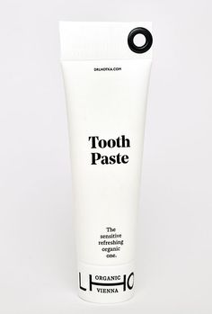 a tube of tooth paste on a white background