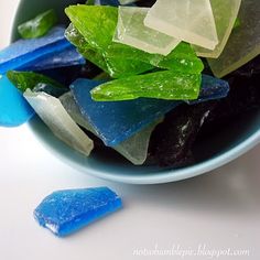 blue and green sea glass in a bowl