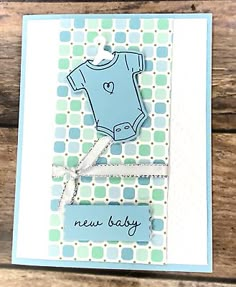 a card with a baby's body on it and the words, new baby