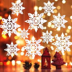 PRICES MAY VARY. ☃ SUPER VALUE & LARGE SNOWFLAKES ☃ -- Christmas snowflake ornament comes in 3 sizes, large snowflakes are 9.84”(25cm), 7.87”(20cm) and 5.9”(15cm) for small snow flakes, 6pcs per each size, 18pcs in total. Large snowflakes, more enough to dress up winter wonderland party, add an extremely winter & festive atmosphere. ☃ NO GLITTER FALL OFF, NO TANGLE ☃ -- High quality material of winter snowflake ornaments, pearl shimmer, no glitter fall off from snowflakes decor. Thicker, sturdy and uneasy to crease snow flake decorations, long lasting. Pre-attached silver string at the end of each single Christmas decoration snowflake individually, easy to hang anywhere, won’t tangle. ☃ 3D EFFECT XMAS DECOR ☃ -- 3 pearlescent white papers, hand made stitched by a silver rope in the middle Hanging Snowflakes, Winter Wonderland-party, Windows Bedroom, 3d Snowflake, Christmas Snowflakes Decorations, Winter Party Decorations, Large Christmas Ornaments, Winter Wonderland Decorations, Christmas Snowflakes Ornaments