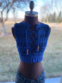 Crochet crop top, size XS, color is a royal blue. Perfect over a bikini or tank top. Folds up small enough to throw in your beach tote or purse. Pair with your favorite jeans, shorts, or sundress. Can also be made to order with your size and color! Pattern by Cozy Creative Crochet. Casual Festival Crop Top, Blue Casual Crochet Top For Beach, Casual Crop Top For Festival, Blue Cropped Crop Top For Summer, Casual Blue Crochet Top For Beach, Blue Sleeveless Crop Top For Beach, Summer Blue Cropped Crop Top, Sleeveless Crop Top For Beach Festival, Beachwear Cropped Crop Top For Beach Season