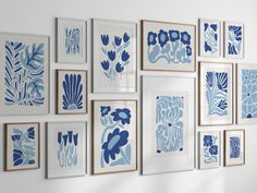 blue and white artwork hangs on the wall