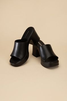 Our Cory Slide Mules boast a distinct sculptural block heel platform that adds a bold finish. The open toe, round style lend an effortless look, while the block heel ensures comfort and stability. The perfect choice for a stylish yet comfortable summer look. Trendy Mules, Heel Care, Platform Mules, Heels Online, Platform Block Heels, Plus Swimwear, Usa Products, Footwear Collection, Fabulous Shoes