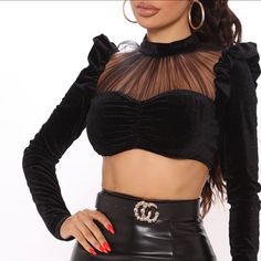 Black Velvet Ruffle Long Sleeve Crop Top. Mesh Top And Zipper Back. Fashionnova Never Worn With Tags. Size Large Chic Stretch Blouse For Club, Chic Evening Crop Top With Ruffles, Chic Fitted Blouse For Club, Fitted Chic Blouse For Club, Glamorous Ruffled Tops For Date Night, Stretch Ruffle Blouse For Night Out, Flirty Ruffled Crop Top For Night Out, Elegant Spring Club Blouse, Elegant Club Blouse For Spring