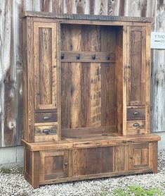 an old wooden cabinet with drawers and doors