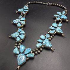 FEDERICO JIMENEZ NATURAL KINGMAN TURQUOISE CLUSTER BLOSSOM NECKLACE DESCRIPTION: This is an exquisite necklace by legendary Oaxacan artisan Federico Jimenez.    Federico always utilizes the finest natural turquoise, much of it from old mines and collections long since depleted.    FEDERICO JIMENEZ was born in Oaxaca, Mexico in 1941 in a Mixtec Indian Community.  He came to the USA in 1967 to study and work.  He studied jewelry making and design at the University Community School.  In 1970 He and Millicent Rogers, Community School, Jewelry Picture, Kingman Turquoise, Taos, Wedding Jewellery Necklace, Natural Turquoise, Native American Jewelry, Heart Of Gold