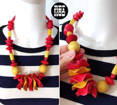 Bold Vintage 80s 90s Red & Yellow Wood Beaded Statement Necklace Please note: color may vary from screen to screen, and in real life.  Total length, unclasped, end to end is 25" Ruffle bead is 2" Wood beads Has a gold twist clasp in the back. Condition: 2  Condition Scale:  1-Immaculate Vintage Condition (Rare) 2-Unnoticeable Vintage Wear or Spots that are unphotographable 3-Small Noticeable Vintage Wear or Spots, as photographed 4-A Lot of Noticeable Vintage Wear or Spots, as photographed 5-Nee Handmade Red Retro Beaded Necklaces, Handmade Retro Red Beaded Necklaces, Retro Multicolor Adjustable Necklaces, Handmade Red Beaded Retro Necklace, Vintage Multicolor Wooden Beads Jewelry, Vintage Red Necklace With Large Beads, Vintage Multicolor Large Beads, Diy Wire Earrings, Ruffle Beading