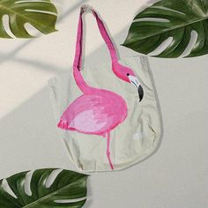 Flamingo tote bag.  Here is the sample for customized hand painted tote bag. You will get whatever you like such as any animal, text, colours, and many more personalized options. Handpainted Totes, Painting Ideas Tote Bag, Paintings On Bags, Decorating Tote Bags, Cute Tote Bag Ideas, Hand Painted Tote Bags Art, Hand Painted White Canvas Bag, Toad Bag Painting, Paint Tote Bag