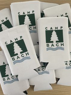 six camp beach tea towels with trees on them and the words camp bach printed on them