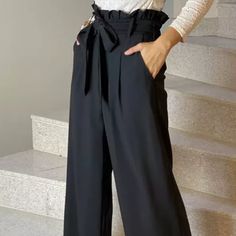 Brand New New Design High Waist Solid Color Trousers Frilled Wide Leg Pants For Women Deep Pockets 100% Polyester Zipper And Tie Elastic Waiste Great For Office Or Holiday Chic Black Belted Wide Leg Pants, Elegant Non-stretch Dress Pants With Belt Loops, Elegant Belted Bottoms For Party, Black Belted High Waist Wide Leg Pants, High Waist Belted Pants For Party, Belted High-waisted Pants For Party, Party Wide Leg Belted Bottoms, Chic Non-stretch Wide Leg Pants With Belt Loops, Black Belted Bottoms For Work