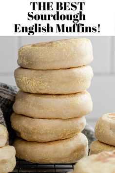 a stack of doughnuts sitting on top of a cooling rack next to other pastries