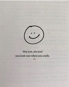 an open book with a drawing of a smiley face on the page and text that reads hey you, yes you