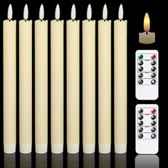 six lit candles with remote controls in front of them and the number one on each candle