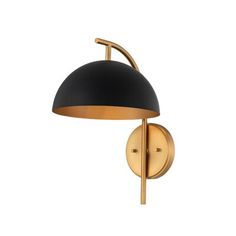 a black and gold wall light on a white background