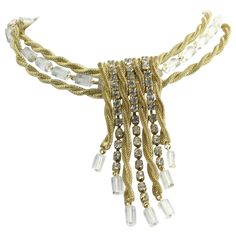 Scassi goldtone rope necklace surrounding Lucite cylinders and square rhinestones. The clasp has a rhinestone center surrounded by seven faux-pearls. Center rhinestone piece, 4.25"L. Signed "Scassi" on one side and "CN" on the back of the tag. Pearl Fringe, Feminine Necklace, Decoration House, Branch Necklace, Back Necklace, Jewelry Fashion Trends, Acrylic Jewellery, Leaf Jewelry, White Gold Necklaces