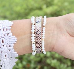 PLEASE read ENTIRE listing BEFORE purchasing These gorgeous custom watch bands are the perfect arm candy for your Apple Watch! Choose your color scheme and you're ready to rock your arm stack, watch in tow! Note: *These bands fit 38mm and 40mm Apple Watch faces ONLY and are ONE SIZE to fit an average sized wrist. I do not offer custom sizes. *Stretching the band over the user's hand is not recommended as this could break the band. It is recommended to attach one side, place the watch and band on White Round Beads Bracelets For Everyday Use, Adjustable White Beaded Bracelet For Everyday, Everyday White Round Bead Bracelets, White Beaded Jewelry For Everyday Use, White Beaded Everyday Jewelry, White Wrap Bracelet With Round Beads For Everyday, White Round Beads Wrap Bracelet For Everyday, White Round Beads Wrap Bracelet For Daily Wear, White Bracelet Strap Watch Bands