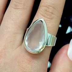 This listing is for a one 925 Morganite Faceted Teardrop Sterling Silver Ring. A few options are pictured to show the natural variation in the stone.  Please keep in mind these rings are hand made and hand designed; therefore each teardrop may vary slightly in size and each stone used may vary slightly in color.  Morganite is a transparent stone that is typically peach to light pink in hue. It is a variety of Beryl just like Aquamarine and Emerald. This stone was discovered by George Kunz who na Teardrop Sterling Silver Crystal Promise Ring, Sterling Silver Teardrop Crystal Promise Ring, Sterling Silver Teardrop Crystal Ring For Promise, Sterling Silver Teardrop Rings, Classic Sterling Silver Teardrop Ring, Sterling Silver Teardrop Crystal Gemstone Ring, Sterling Silver Teardrop Crystal Ring For Anniversary, 925 Stamped Drop Jewelry For Anniversary, Elegant Teardrop Ring With Large Stone