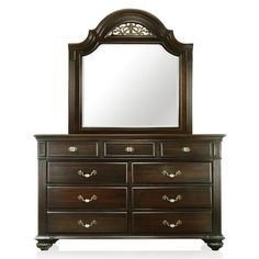 an ornate dresser with mirror and drawers on it's sides, against a white background